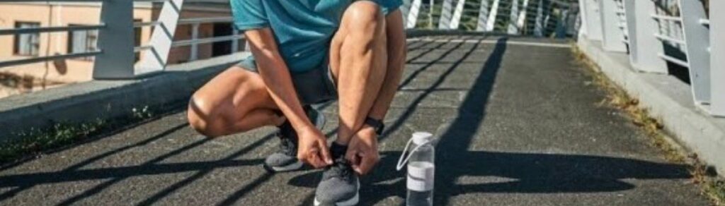 Man tying his shoes