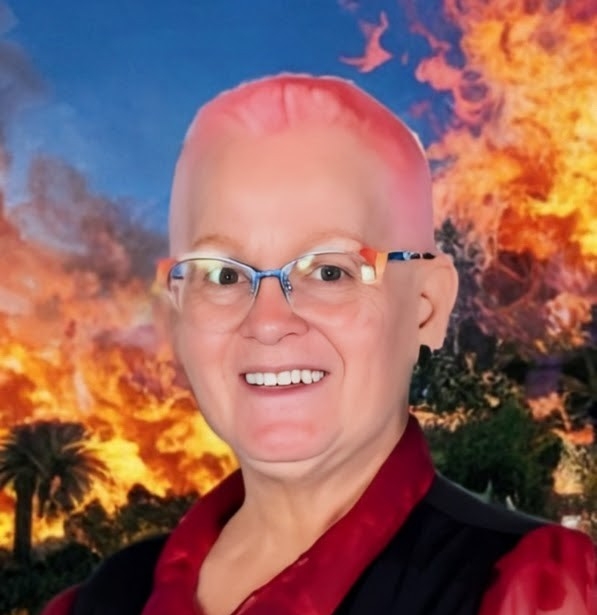4508 - Rejuva Sole™ Portrait of Tammy Eddy, founder of Rejuva Sole, smiling and wearing glasses
