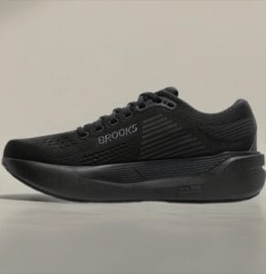 Bazaart_20260714_124000_137 - Rejuva Sole™ Black Brooks running shoe side view with breathable perforated upper and thick cushioned midsole.