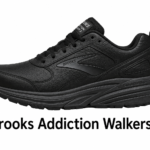 Black Brooks Addiction Walker 2 walking shoe with a textured leather upper and chunky sole, side logo visible.