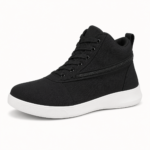 Black mid-cut sneaker with a white sole and side zipper detail