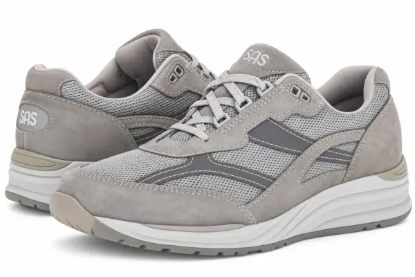 SAS Men’s Journey Mesh — AI shoe illustration - Rejuva Sole™ Grey SAS athletic sneakers with mesh panels and cushioned white sole, side view.
